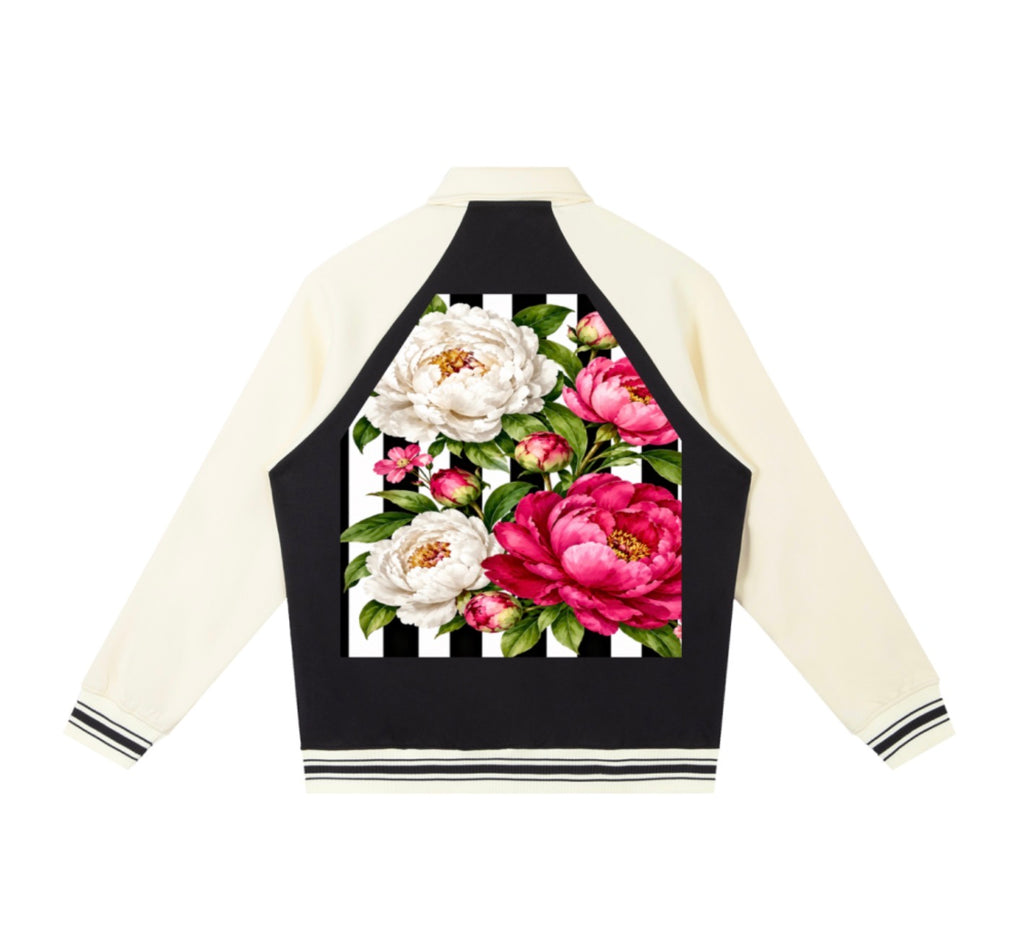 Back view of contrast raglan sleeve baseball jacket with pink and white floral artwork