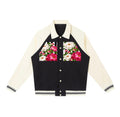 Front view of contrast raglan sleeve baseball jacket with pink and white floral artwork